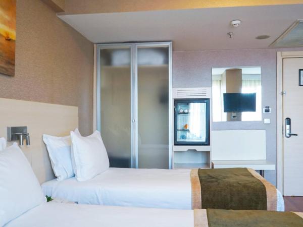 Hotel Troya : photo 7 de la chambre chambre familiale supérieure