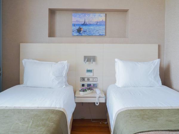 Hotel Troya : photo 4 de la chambre chambre double ou lits jumeaux Économique