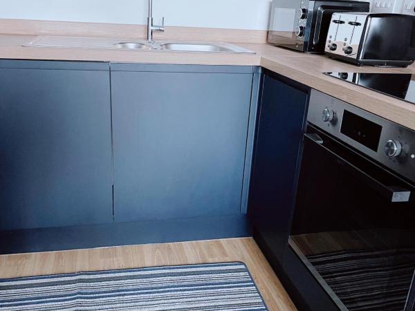 Modern House : photo 4 de la chambre chambre double avec salle de bains privative