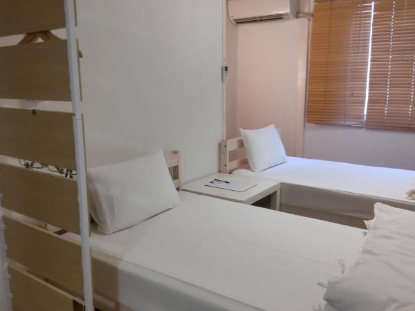 コインズホステル天神ペット宿泊可 : photo 2 de la chambre chambre lits jumeaux standard