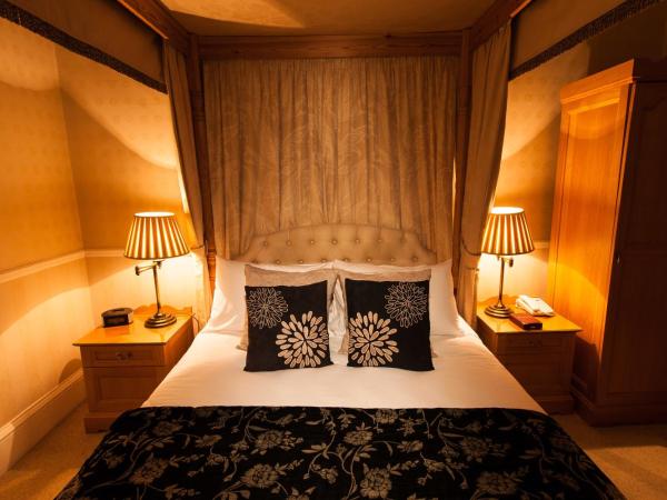 Kildonan Lodge Hotel : photo 1 de la chambre chambre double avec lit à baldaquin