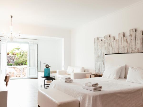 Astro Palace Hotel & Suites : photo 1 de la chambre suite junior avec jaccuzi