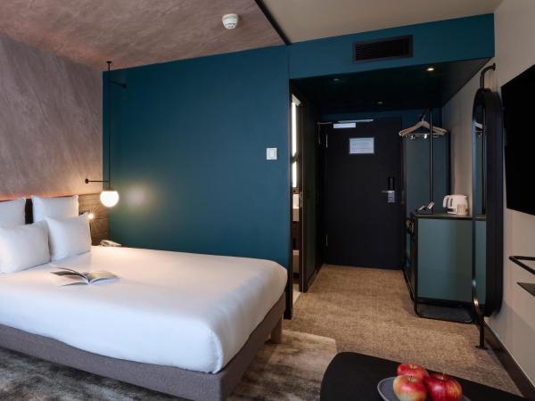 Novotel Bern Expo : photo 2 de la chambre chambre lit queen-size supérieure avec canapé