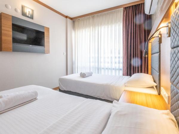 Hotel Sunday Beach : photo 3 de la chambre chambre double - vue sur terres