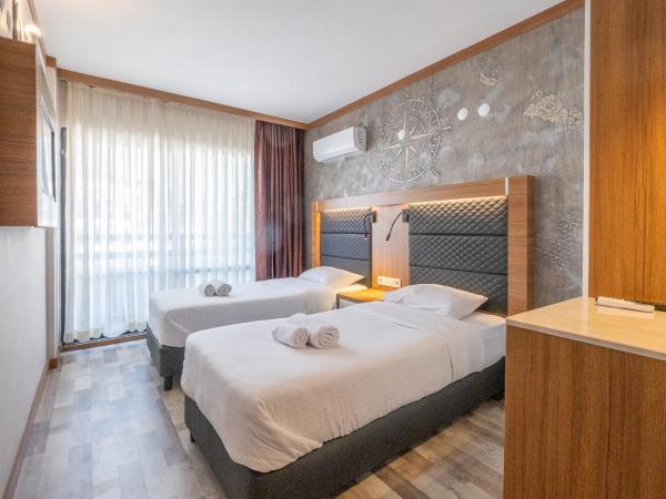 Hotel Sunday Beach : photo 4 de la chambre chambre double - vue sur terres