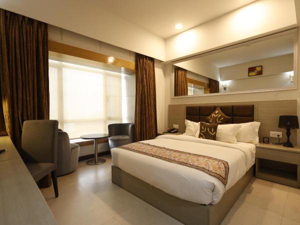 Aristocrat Hotel, New Town, Kolkata : photo 1 de la chambre chambre lit queen-size deluxe