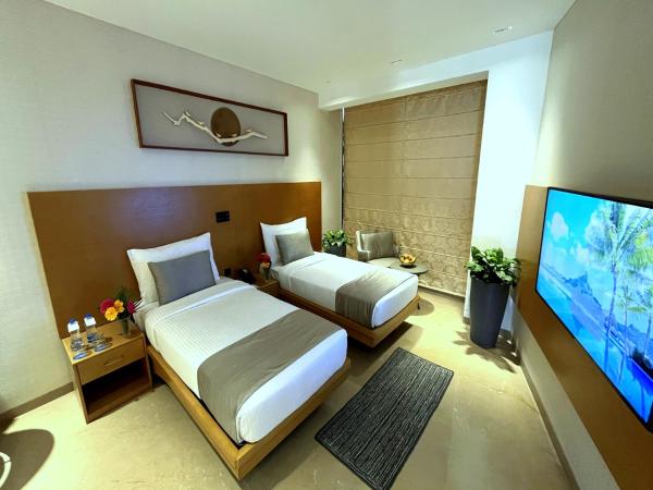 Morvee Hotels Alipore Kolkata : photo 7 de la chambre chambre lits jumeaux supérieure