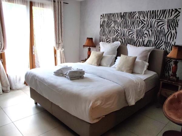 Maison Prestige Saint Tropez by Roberto Geissini : photo 2 de la chambre chambre deluxe