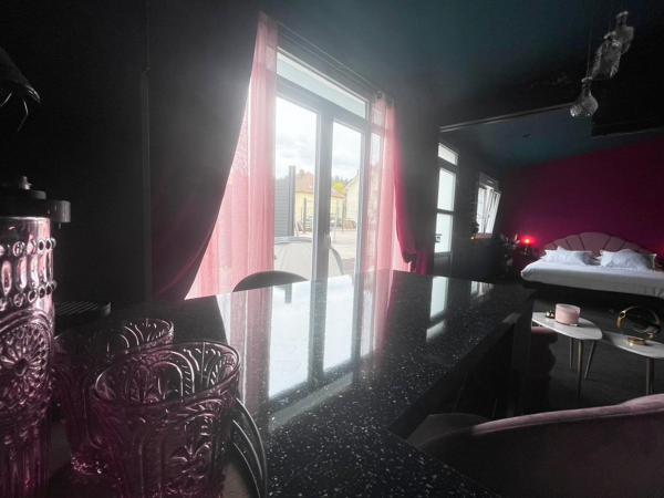 NUITS D'EXIL : photo 2 de la chambre suite avec jacuzzi