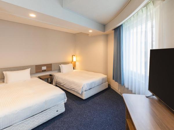 Sotetsu Fresa Inn Tokyo-Toyocho : photo 2 de la chambre chambre quadruple premium