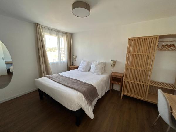 Logis Hotel De La Clape : photo 6 de la chambre suite familiale