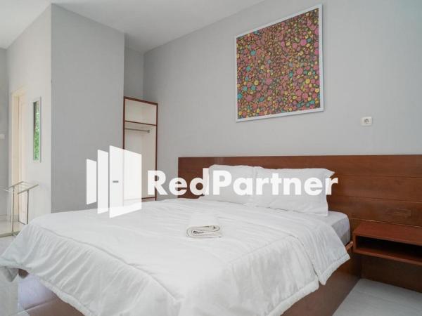 House Acasia Syariah near Universitas Aisyiah Yogyakarta Mitra RedDoorz : photo 10 de la chambre chambre deluxe