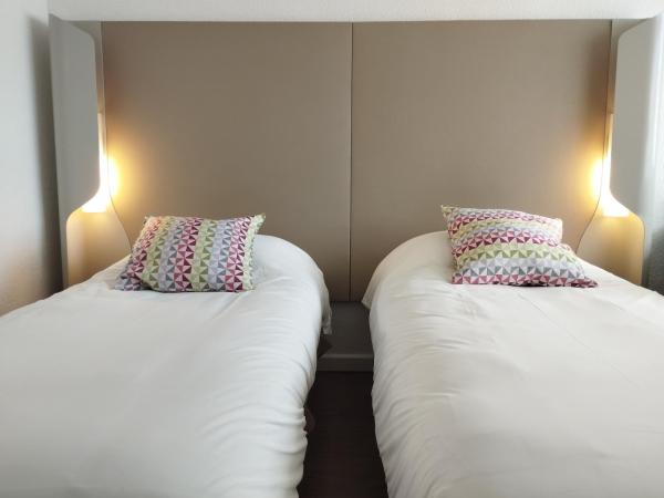 Noemys ARLES : photo 3 de la chambre chambre lits jumeaux standard
