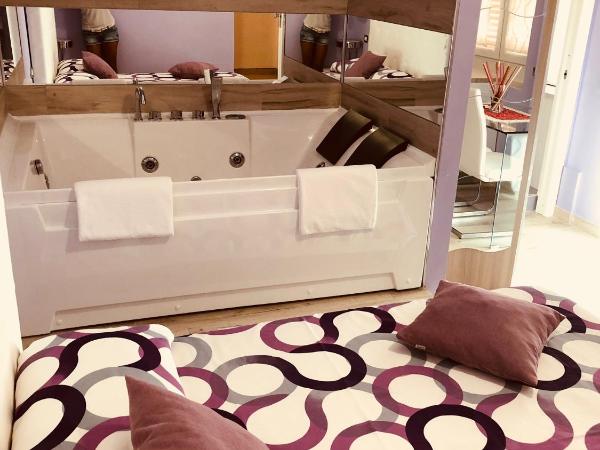 al Corso 203 : photo 10 de la chambre chambre lit king-size avec baignoire spa