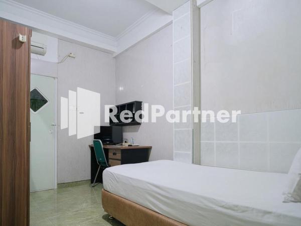 Pondok Hijau Syariah Mitra RedDoorz At Citraland Surabaya : photo 2 de la chambre chambre simple