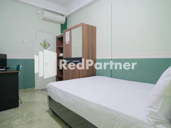 Pondok Hijau Syariah Mitra RedDoorz At Citraland Surabaya : photo 2 de la chambre chambre double standard