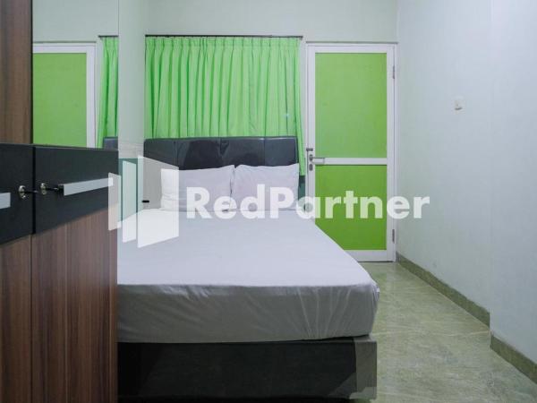 Pondok Hijau Syariah Mitra RedDoorz At Citraland Surabaya : photo 1 de la chambre chambre double standard