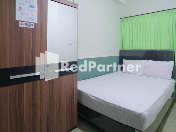 Pondok Hijau Syariah Mitra RedDoorz At Citraland Surabaya : photo 7 de la chambre chambre double standard