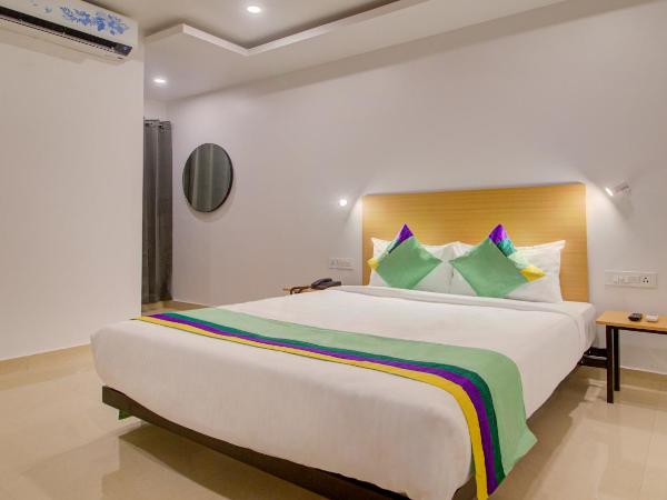 Treebo De Alphabet Kondapur : photo 1 de la chambre chambre double standard