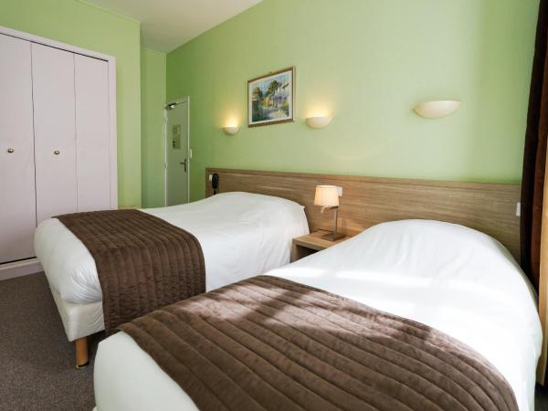 Cit'Hotel Hôtel Beauséjour : photo 2 de la chambre chambre lits jumeaux