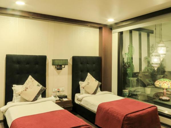 The Nanee Suites : photo 4 de la chambre chambre deluxe double ou lits jumeaux