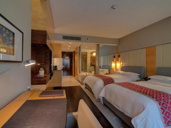 JW Marriott Hotel New Delhi Aerocity : photo 3 de la chambre chambre deluxe 2 lits doubles 