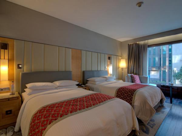 JW Marriott Hotel New Delhi Aerocity : photo 2 de la chambre chambre deluxe 2 lits doubles 