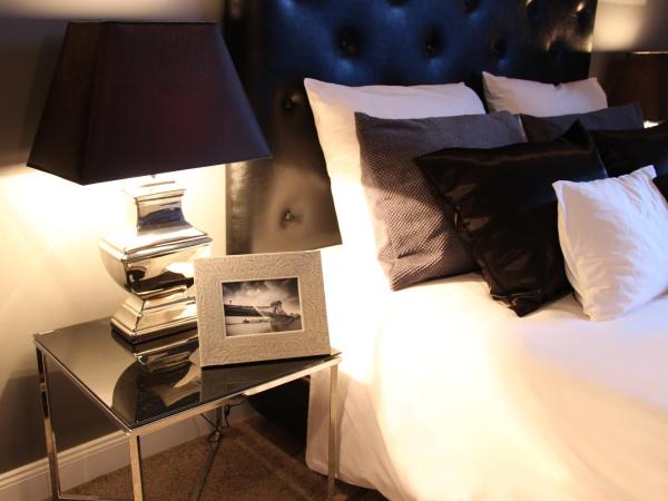 Balance Home : photo 3 de la chambre chambre lit king-size de luxe - vue sur rivière