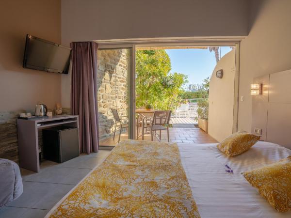 Hotel Le Grand Pavois : photo 1 de la chambre chambre familiale - vue sur jardin