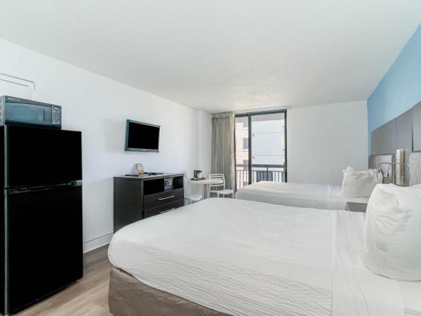 Sun N Sand Resort : photo 5 de la chambre hébergement premier avec 2 lits queen-size et balcon - vue sur océan
