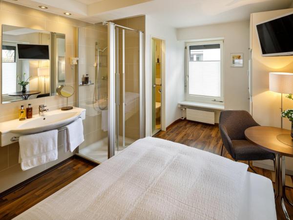 Aparthotel Familie Hugenschmidt : photo 1 de la chambre chambre simple classique avec douche et toilettes