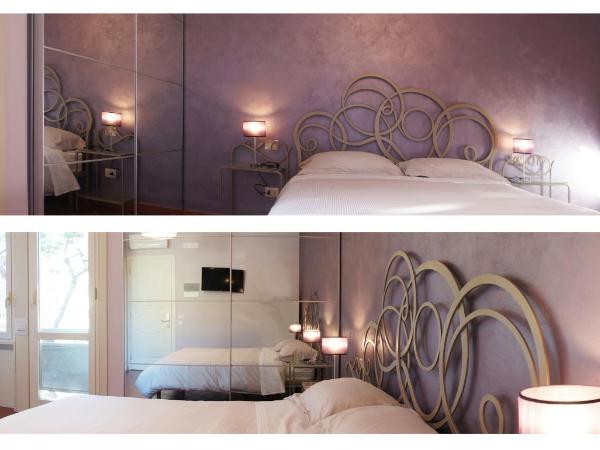 B&B Terrazza Belfiore : photo 1 de la chambre chambre quadruple