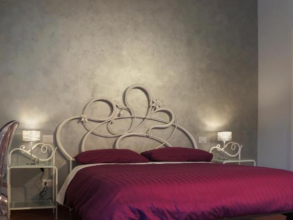 B&B Terrazza Belfiore : photo 4 de la chambre chambre quadruple