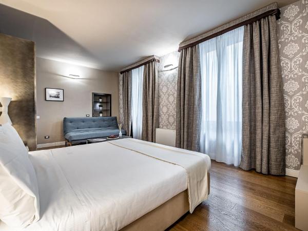 Martelli 6 Suite & Apartments : photo 4 de la chambre chambre triple supérieure