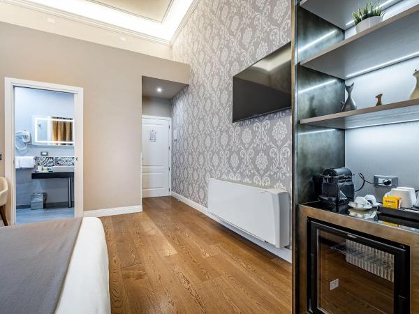 Martelli 6 Suite & Apartments : photo 4 de la chambre chambre lit king-size supérieure