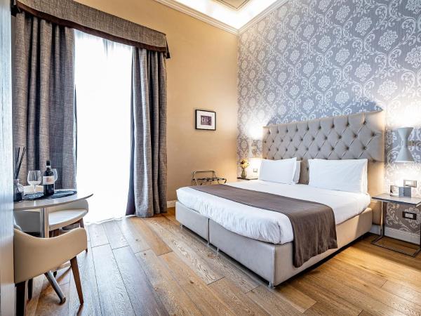 Martelli 6 Suite & Apartments : photo 7 de la chambre chambre lit king-size supérieure