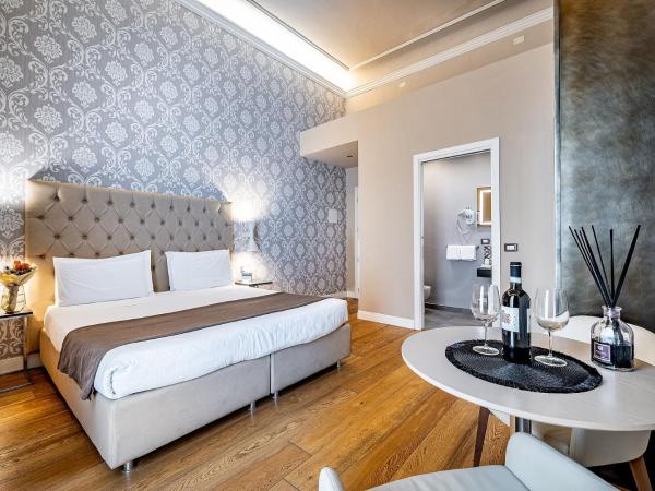 Martelli 6 Suite & Apartments : photo 10 de la chambre chambre lit king-size supérieure