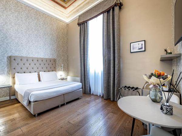 Martelli 6 Suite & Apartments : photo 1 de la chambre chambre double supérieure