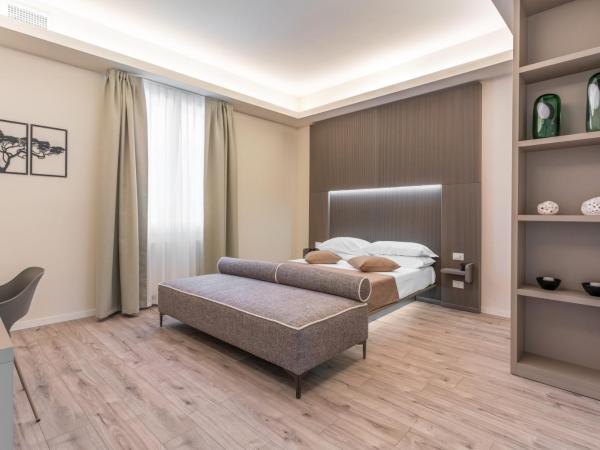 Meneghina Suites Foresteria Lombarda : photo 1 de la chambre chambre double avec lit d'appoint
