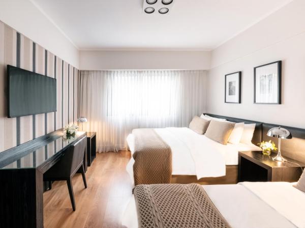 Principado Downtown : photo 4 de la chambre chambre triple