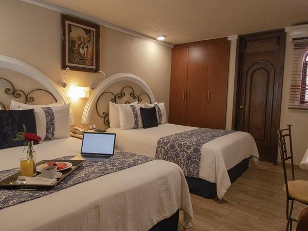 Arcángel Puebla : photo 3 de la chambre chambre double avec 2 lits doubles