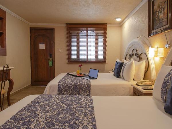 Arcángel Puebla : photo 1 de la chambre chambre double avec 2 lits doubles