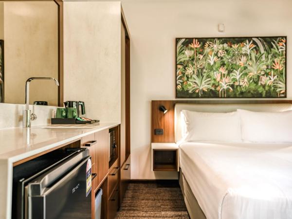 Palms City Resort : photo 1 de la chambre bungalow jardin