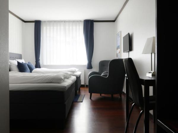 Helnan Phønix Hotel : photo 3 de la chambre chambre quadruple