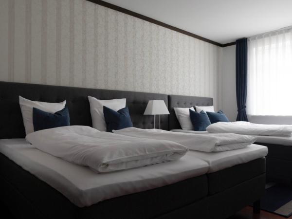 Helnan Phønix Hotel : photo 4 de la chambre chambre quadruple