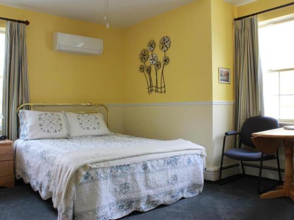 Garden South Park Inn : photo 4 de la chambre chambre lit queen-size