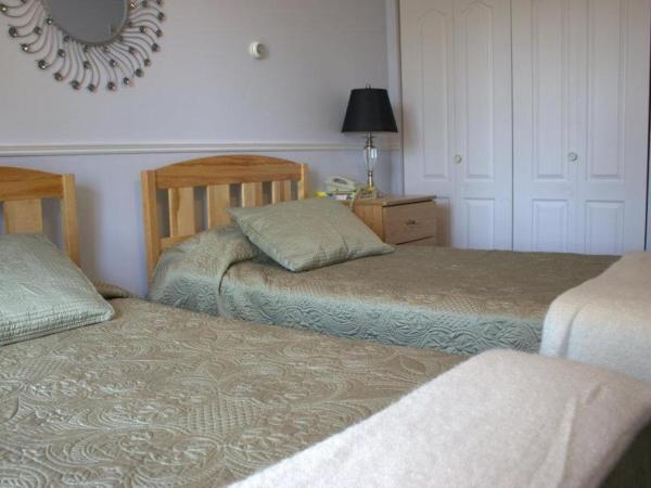 Garden South Park Inn : photo 2 de la chambre chambre lits jumeaux