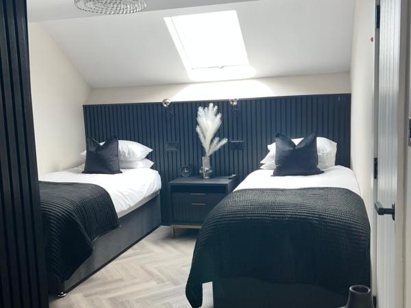 128 Anfield Road : photo 5 de la chambre chambre lits jumeaux spacieuse