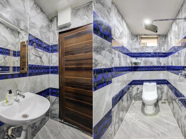 Treebo Love Shore Residency, Near Lakeshore Hospital : photo 6 de la chambre chambre double deluxe