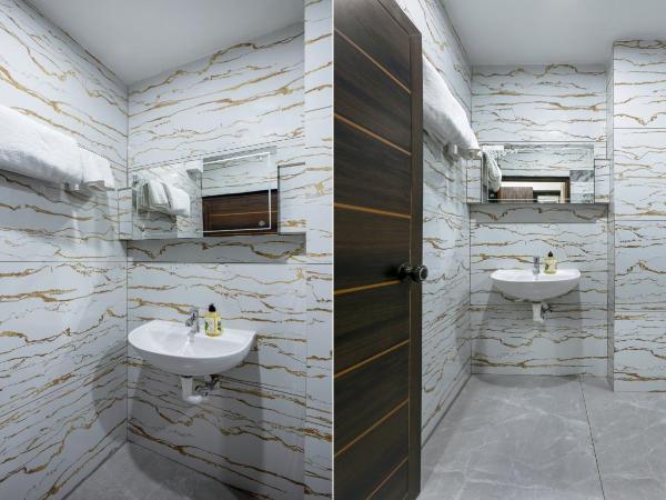 Treebo Love Shore Residency, Near Lakeshore Hospital : photo 6 de la chambre chambre double standard